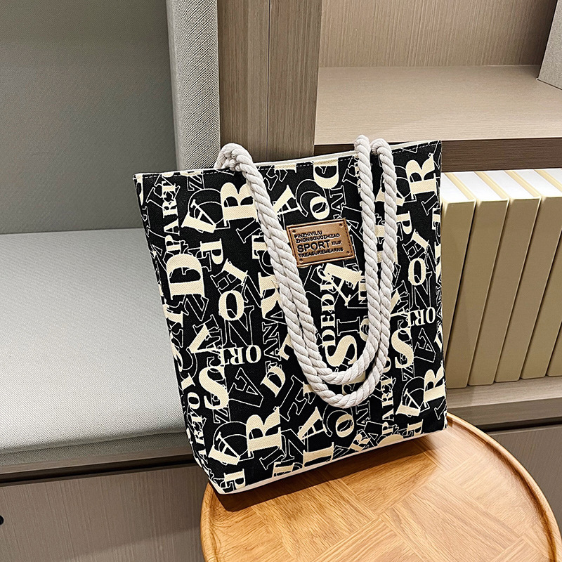 2025 New Women's Large Canvas Bag Designer Fashionable and Elegant Multi functional Handbag