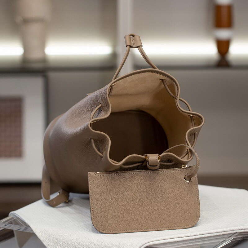 New Genuine Leather Women S Elegant Commuting Versatile Casual Cowhide Drawstring Backpack Simple Lock Buckle Small Bag High Quality