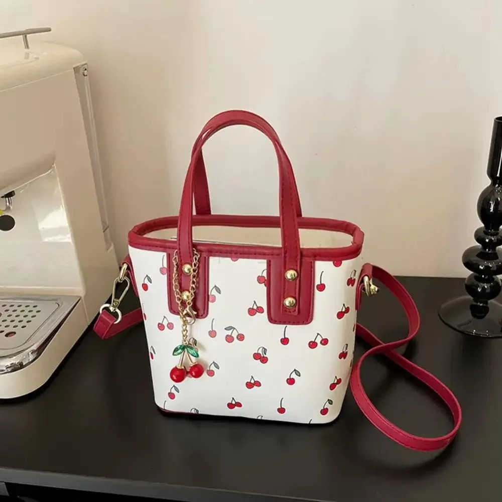 Stylish PU Leather Cherry Shoulder Bag Large Capacity Adjustable Strap Crossbody Bag Comfort with Cherry Pendant Handbag Women M251024