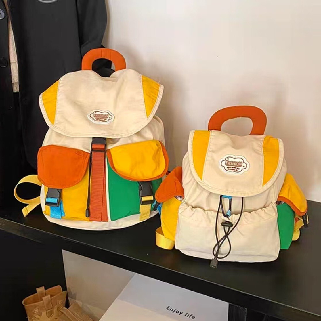 New designer children's backpack for kindergarten boys and girls, outdoor fashion, color blocked hiking, lightweight and fashionable parent-child