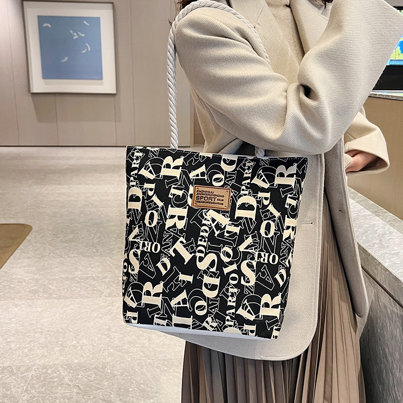 2025 New Women's Large Canvas Bag Designer Fashionable and Elegant Multi functional Handbag