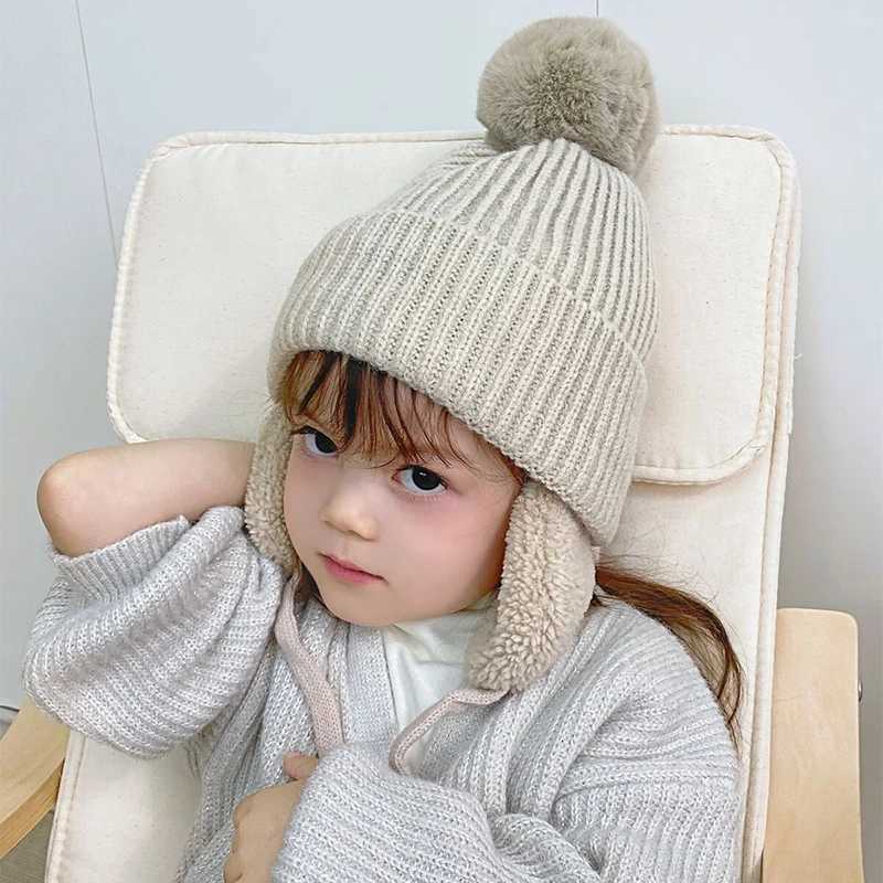 Children Warm Earmuffs Cap Cute Plush Ball Knitted Hat 28year Kids Ear Protection Hats Baby Solid Woolen Winter Beanies BonnetL251024