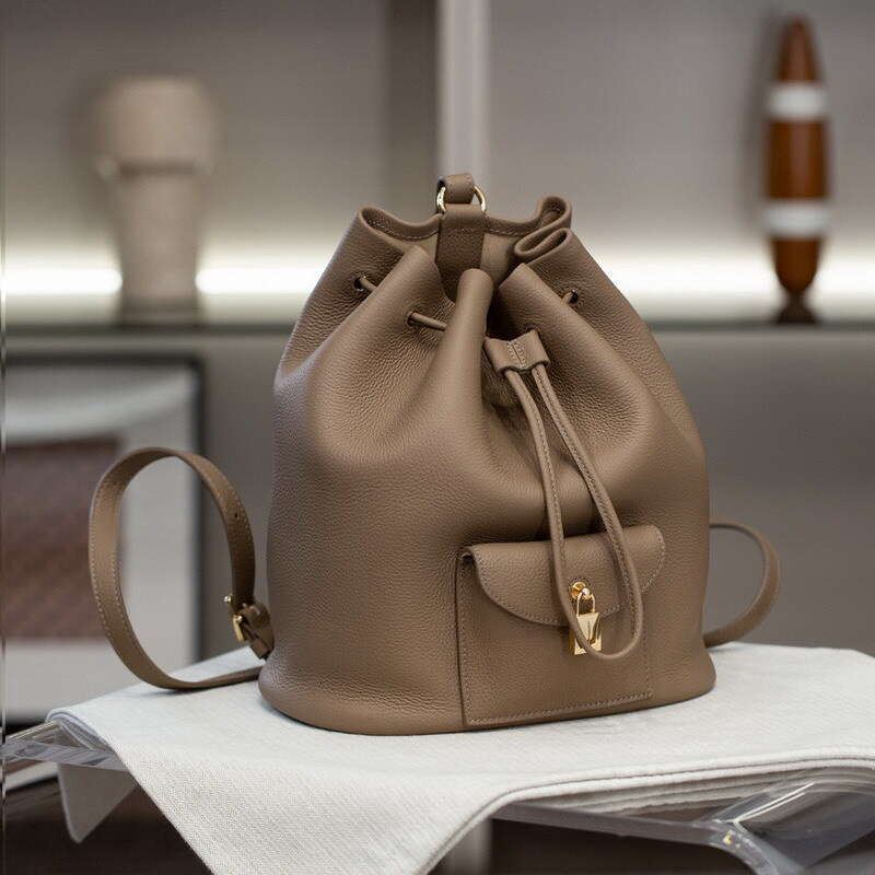 New Genuine Leather Women S Elegant Commuting Versatile Casual Cowhide Drawstring Backpack Simple Lock Buckle Small Bag High Quality
