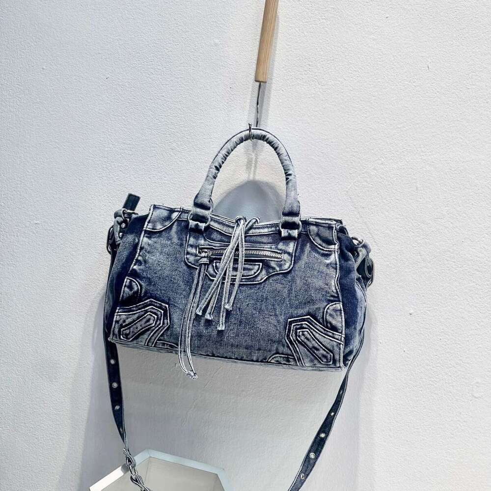 New Women's High-End Denim Motorcycle Tassel Rivet Handbag Fashion Versatile Washed Fabric Crossbody Bag for Women