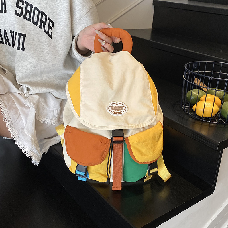 New designer children's backpack for kindergarten boys and girls, outdoor fashion, color blocked hiking, lightweight and fashionable parent-child