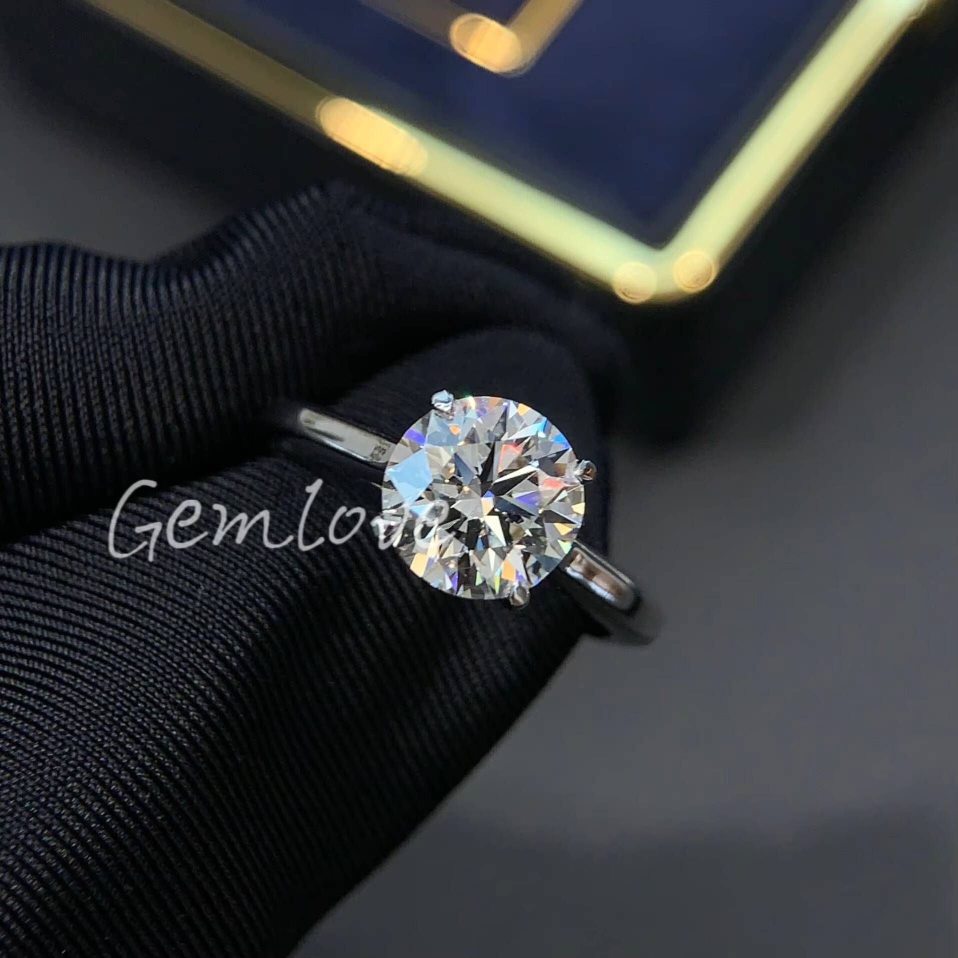 unique 18K gold ring designed exclusively for women featuring a 2carat labgrown round diamond GIAcertified engagement ring