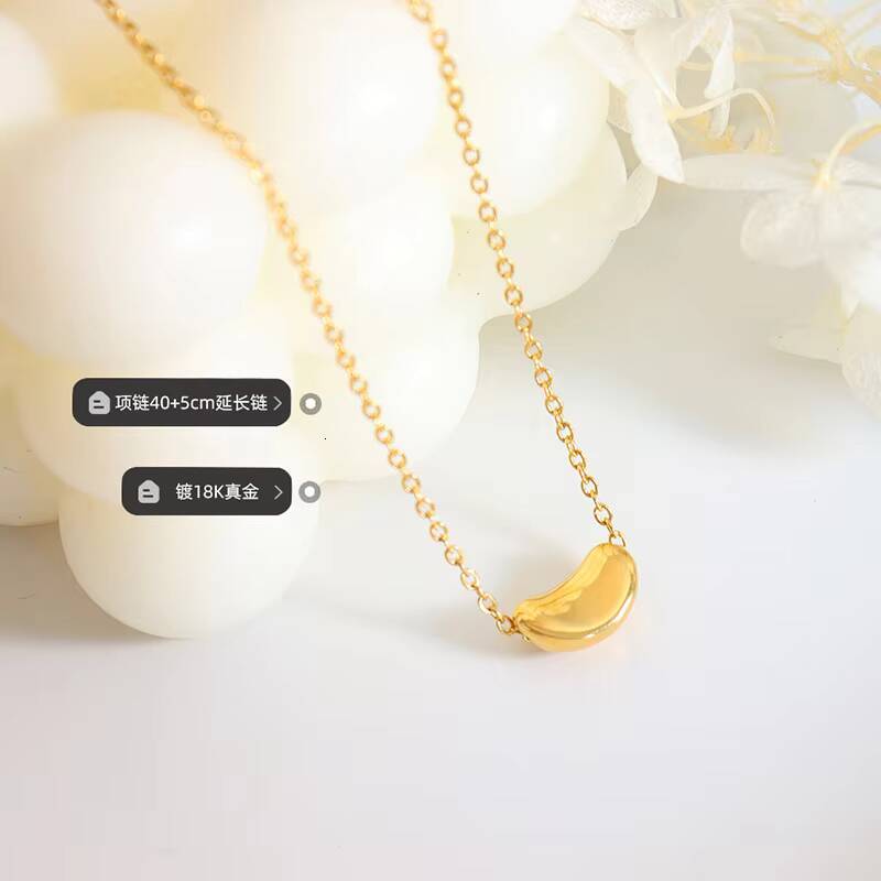 Hot Selling Womens Stainless Steel 18K Gold Plated Necklace Fashion Jewelry Chain with Lucky Golden Bean Pendant Zircon Stone