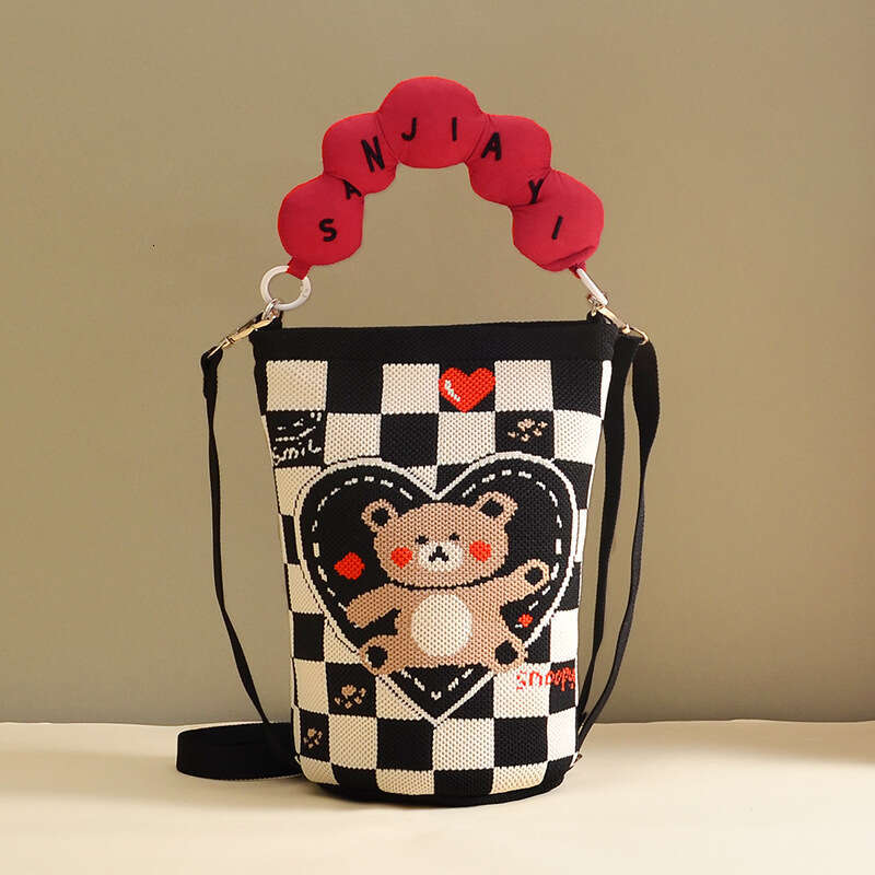 Hot Selling Flying Weave Cartoon Jacquard Bucket Crossbody Women's Fashion Knitted Commuter Phone Small Shoulder Bag