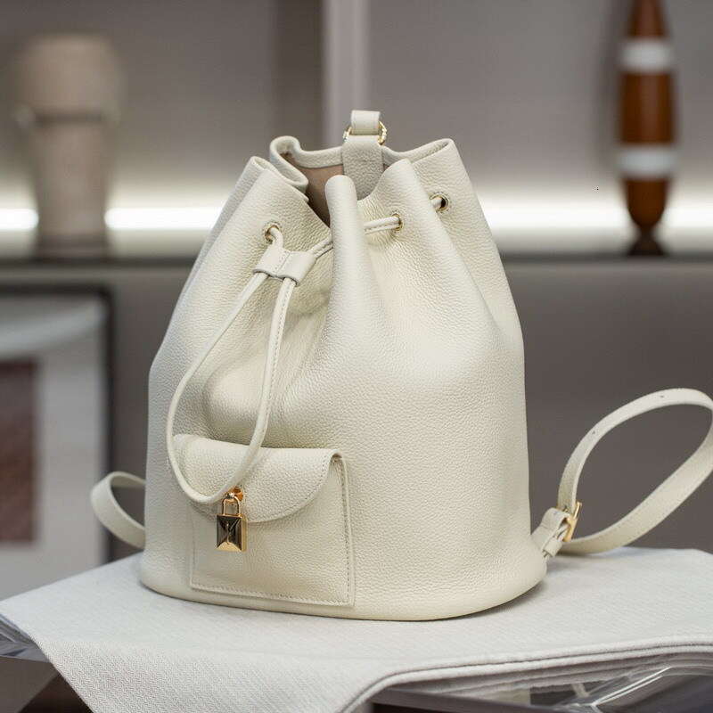 New Genuine Leather Women S Elegant Commuting Versatile Casual Cowhide Drawstring Backpack Simple Lock Buckle Small Bag High Quality