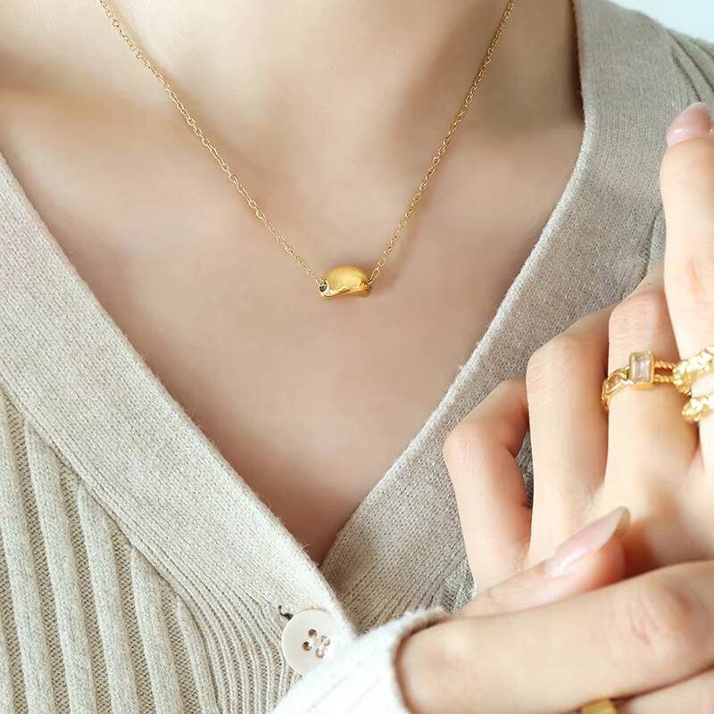 Hot Selling Womens Stainless Steel 18K Gold Plated Necklace Fashion Jewelry Chain with Lucky Golden Bean Pendant Zircon Stone