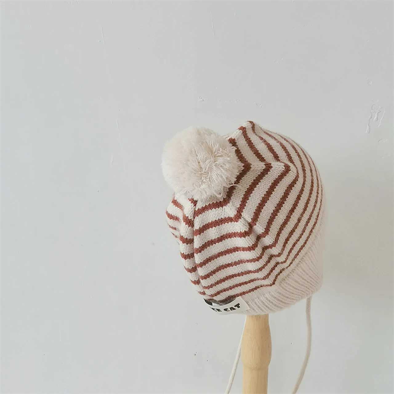 Fashion Striped Children Ear Protection Hat Solid Color Woolen Knit Hat 26Year Kids Winter Warm Pullover Cap Plush Ball BeaniesL251024