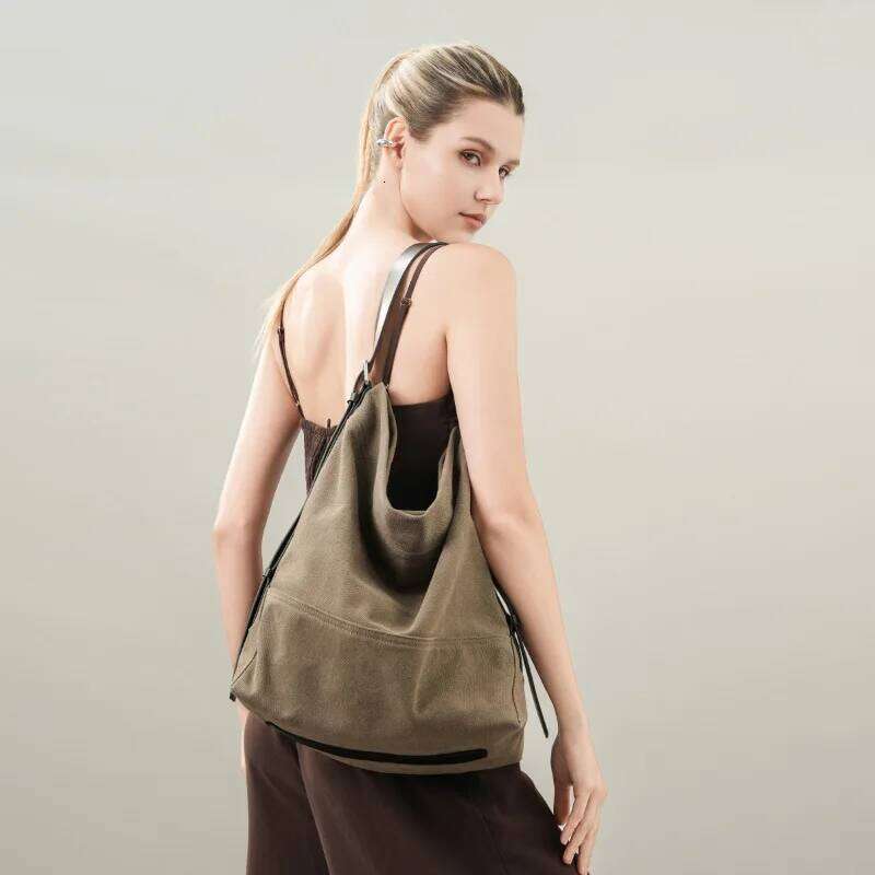 Women's Cowhide Canvas Underarm Commuter Style Bucket Tote Bag Niche Design Single-Shoulder Large-Capacity Travel Handbags 251023 1025