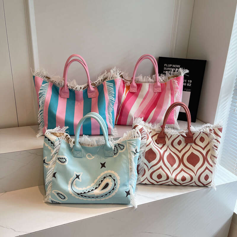 Korean Style Letter Tassel Canvas 2025 New Large Capacity Simple Commuter Student Shoulder Tote Bag Handbag