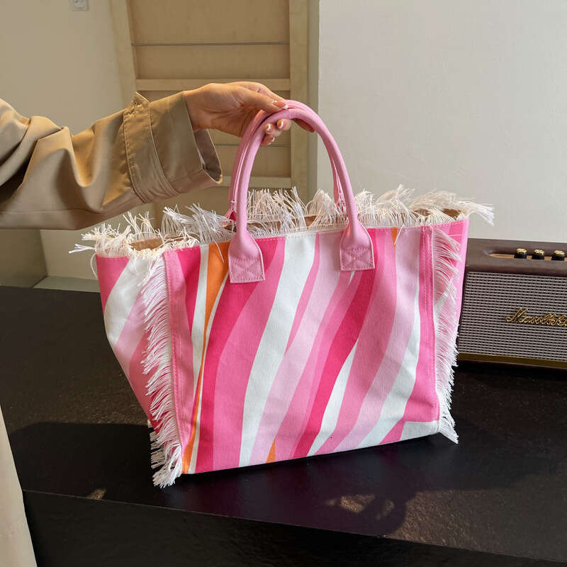 Korean Style Letter Tassel Canvas 2025 New Large Capacity Simple Commuter Student Shoulder Tote Bag Handbag