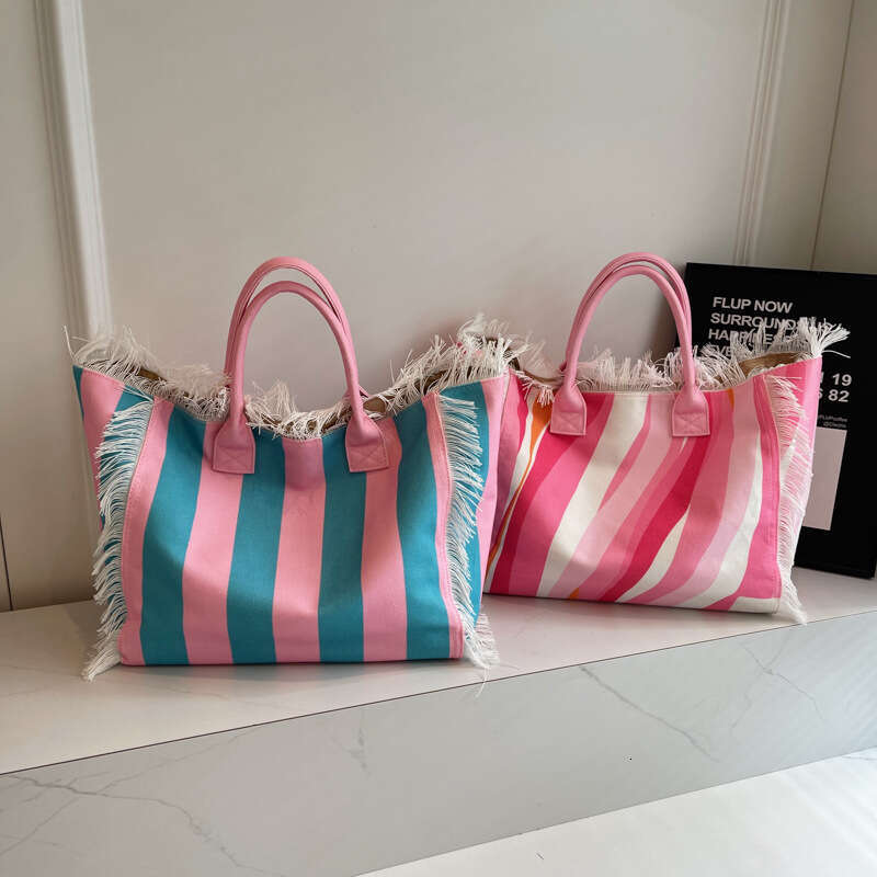 Korean Style Letter Tassel Canvas 2025 New Large Capacity Simple Commuter Student Shoulder Tote Bag Handbag