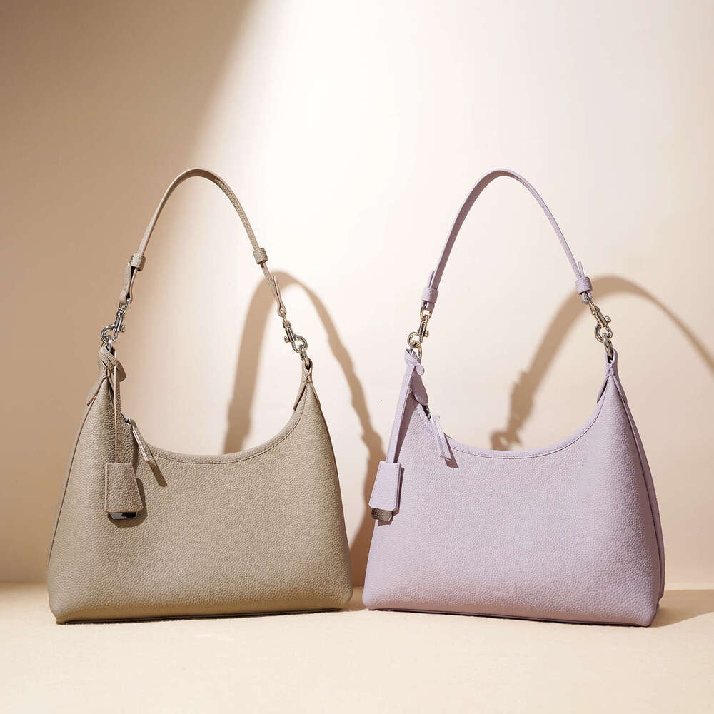 Luxury bag Spring New Niche Design Single Shoulder Elegant High end Simple Top Layer Genuine Leather Women s Gentle Crossbody Bag