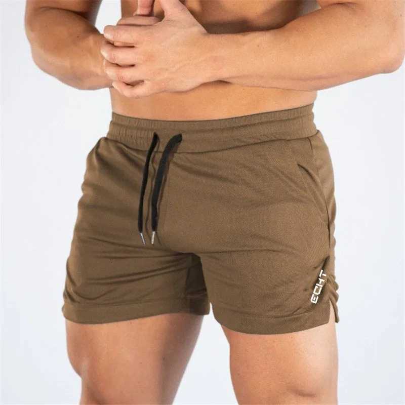 2024 New Fitness Big Muscle Man Fitness Slim Shorts Run And Train On The Beach With Pull Rope And Three Point Fitness ShortsXJ251025
