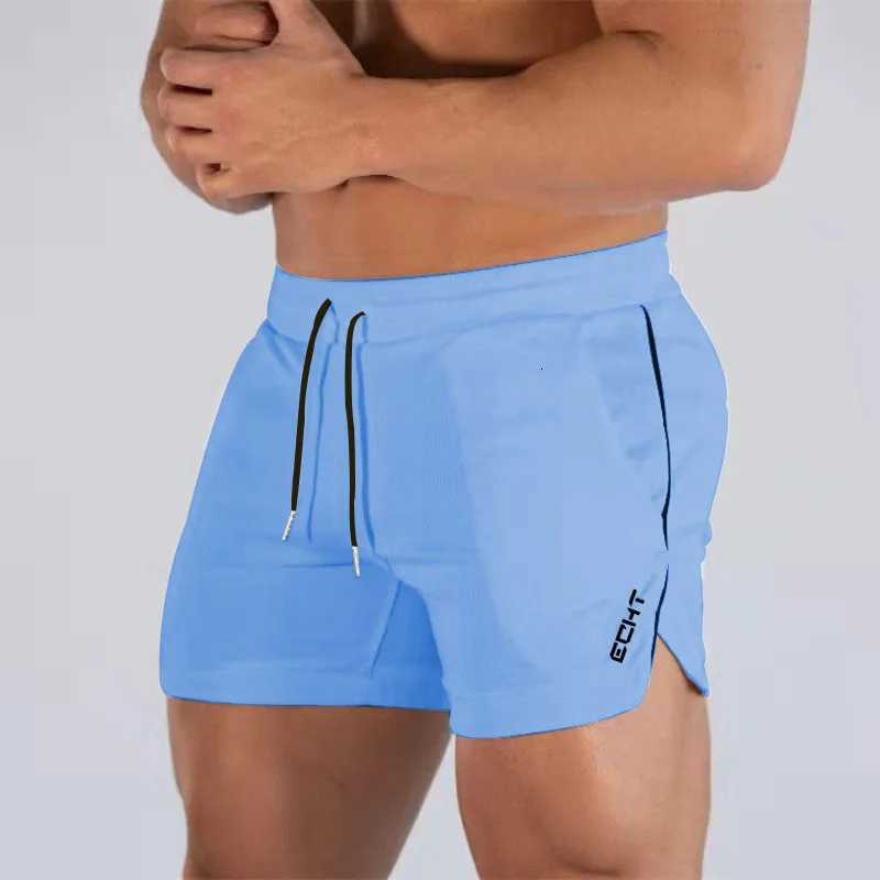 2024 New Fitness Big Muscle Man Fitness Slim Shorts Run And Train On The Beach With Pull Rope And Three Point Fitness ShortsXJ251025