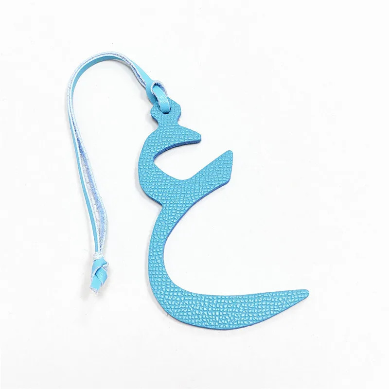 Wholesale Retail Real Natural Leather Character Alphabet Letter Keychain Backpack Pendant Ladie Bag Charm 251021