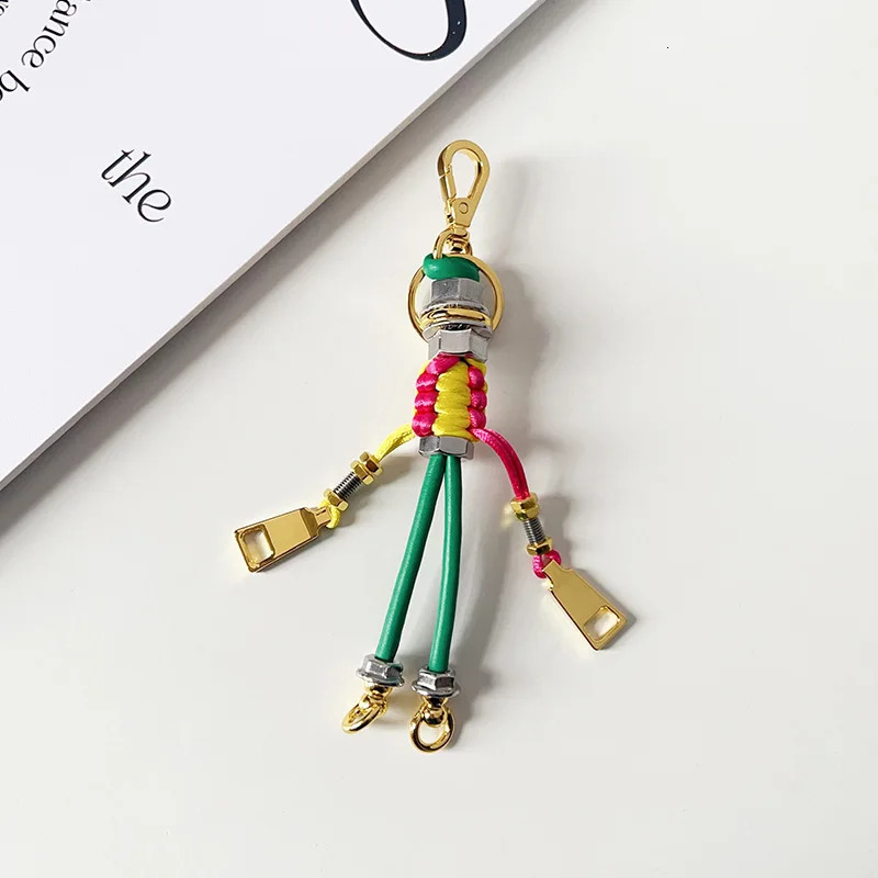 Robot Pendant Metal Rope Woven Lanyard Mens and Womens Bag Pendant Trendy Keychain Creative Car Pendant 251023