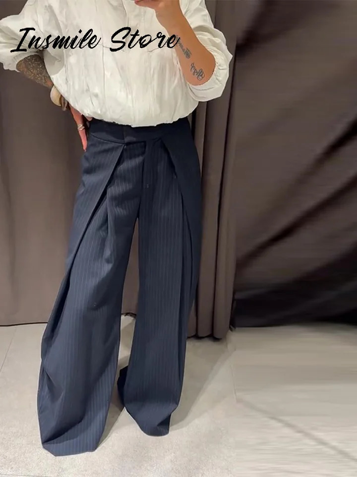 Chic Ripped Zipper Blue jeans Women Low Waist Pocket Female Wide Leg Denim Pants 2025 Autumn Loose Street Lady Trousers 251023