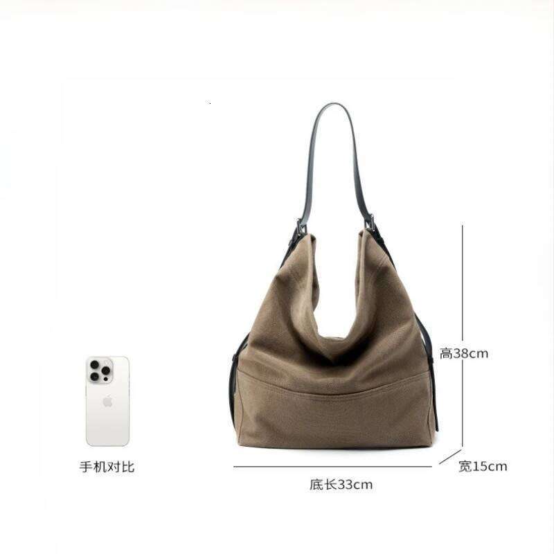 Women's Cowhide Canvas Underarm Commuter Style Bucket Tote Bag Niche Design Single-Shoulder Large-Capacity Travel Handbags 251023 1025