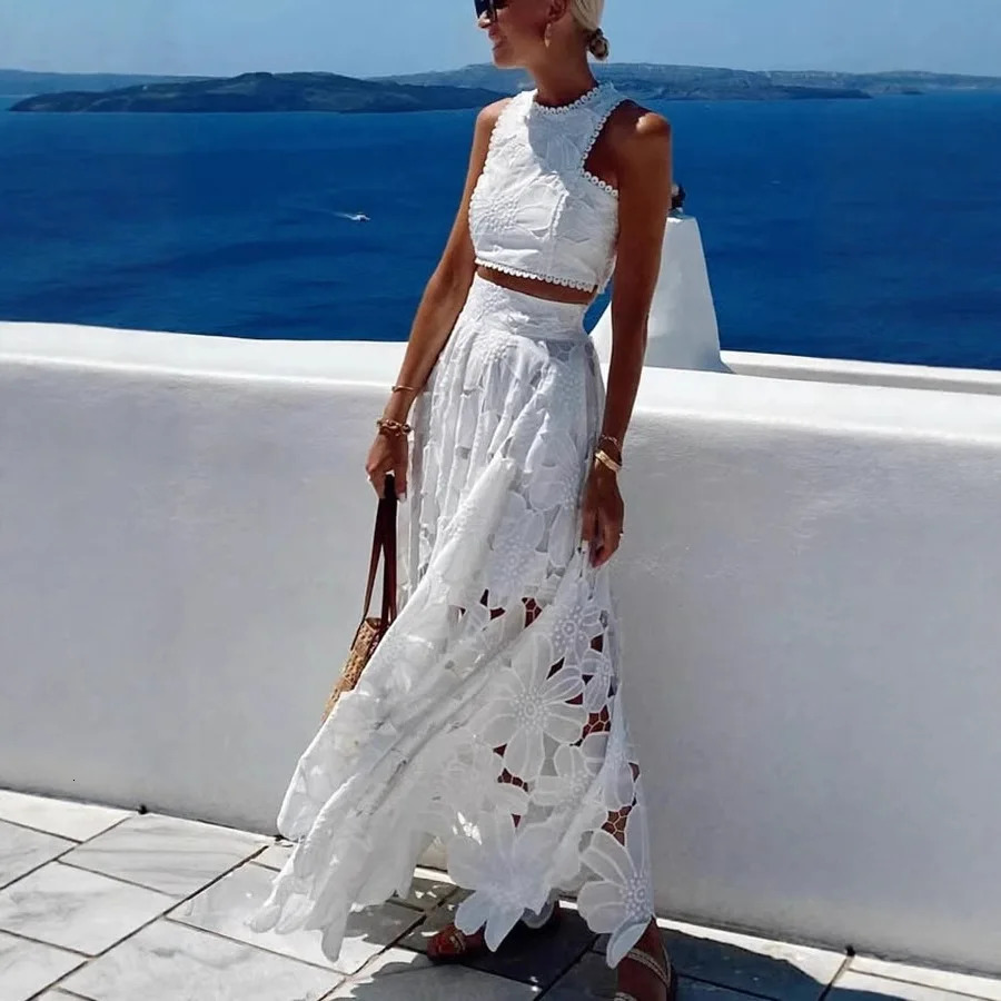 PRINTKAOIR Spring Summer Women White Flower Casual Lace Hollow Out Vest Top And Long Skirt Two Piece Set Holiday 251016