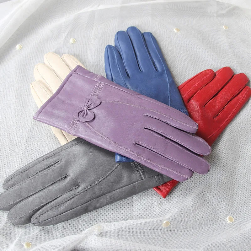Genuine leather gloves winter womens sheepskin insulation thickened and plush thin Haining butterfly Korean version split 251023