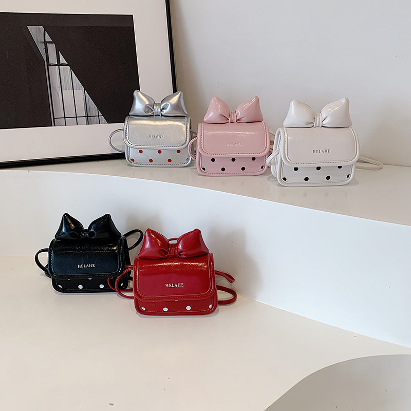 New designer children's bag bow mini square bag parent-child design girl italic coin headphone jack red envelope