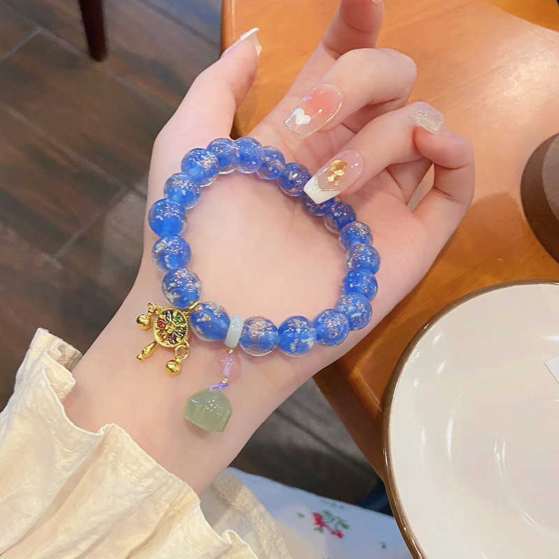 Golden Foil Jade Bead Lotus Hand Bracelet