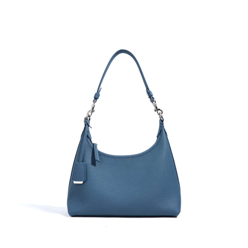 Luxury bag Spring New Niche Design Single Shoulder Elegant High end Simple Top Layer Genuine Leather Women s Gentle Crossbody Bag