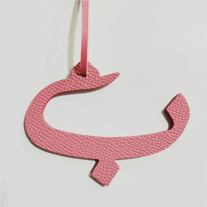 Wholesale Retail Real Natural Leather Character Alphabet Letter Keychain Backpack Pendant Ladie Bag Charm 251021