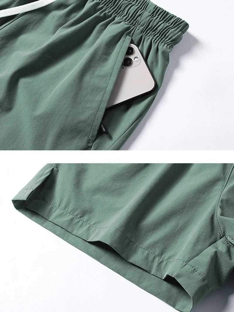 Mens Quick Drying Active Shorts with Zipper Pockets and Drawstring WaistXJ251025