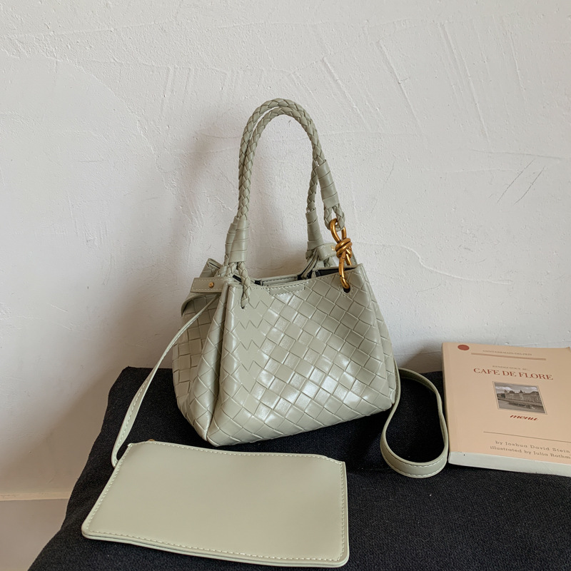 Luxury Brand Designer Bag Woven Pattern Bucket Bag Fashion Niche High-End Sense Basket Bag Soft Leather Commuter Handheld Crossbody Bag For Women