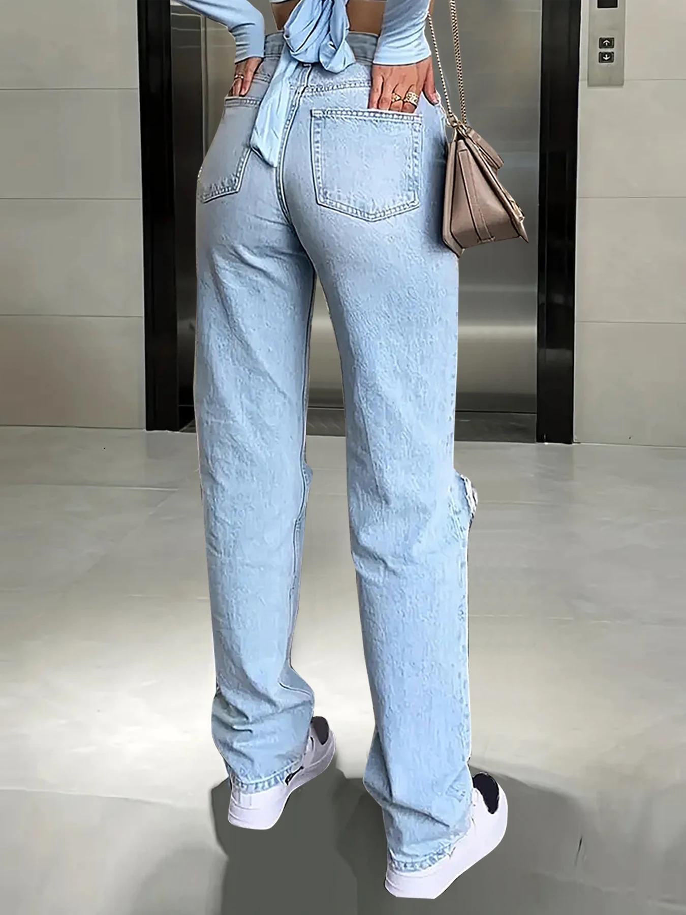 Womens kneepiercing jeans loose comfortable and casual fully matching straight microelastic jeans 251023