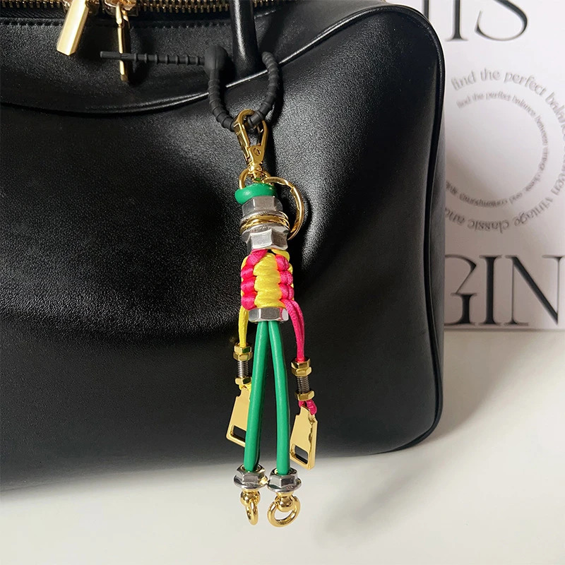 Robot Pendant Metal Rope Woven Lanyard Mens and Womens Bag Pendant Trendy Keychain Creative Car Pendant 251023