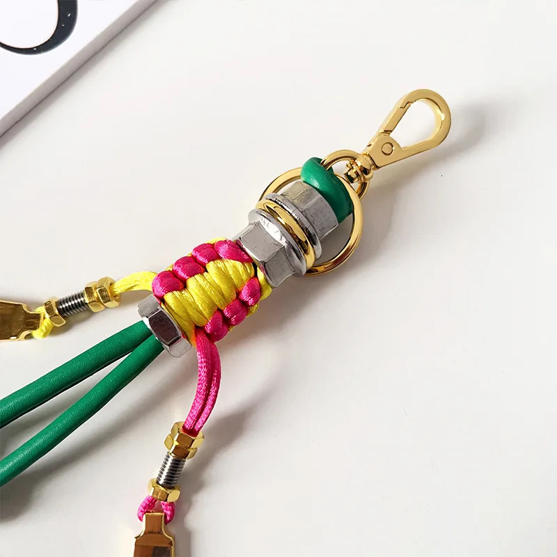 Robot Pendant Metal Rope Woven Lanyard Mens and Womens Bag Pendant Trendy Keychain Creative Car Pendant 251023