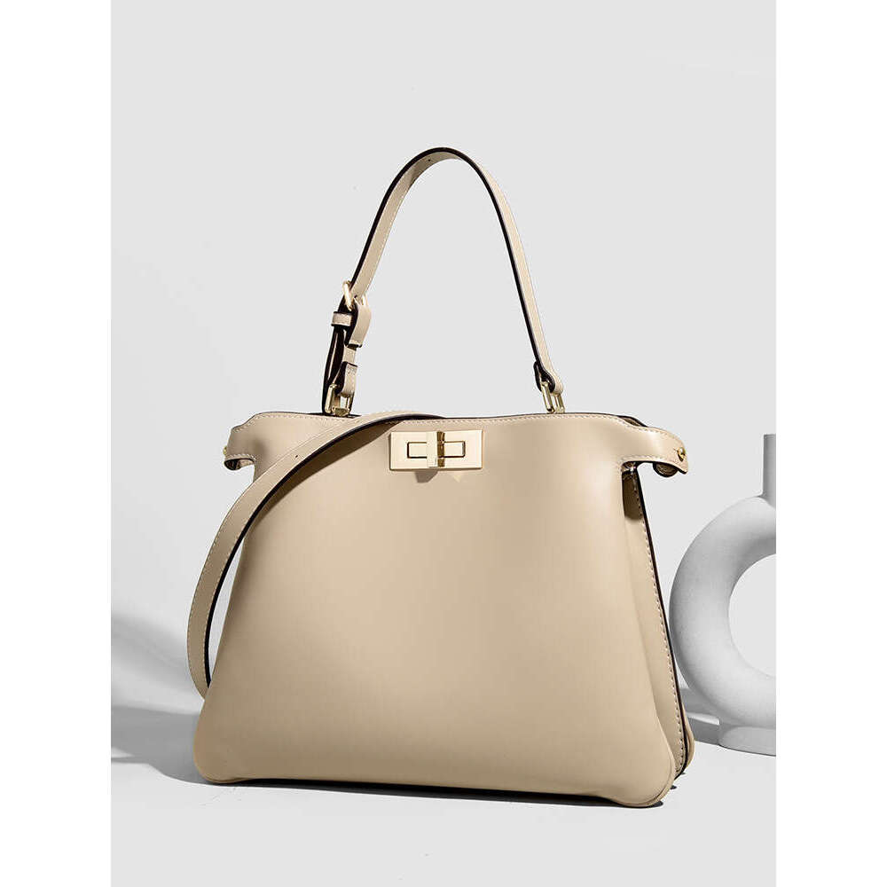 Designer Bags new high-end single-shoulder bag for ladies, a versatile soft leather commuting bag for work, and a stylish hand-held mom bag