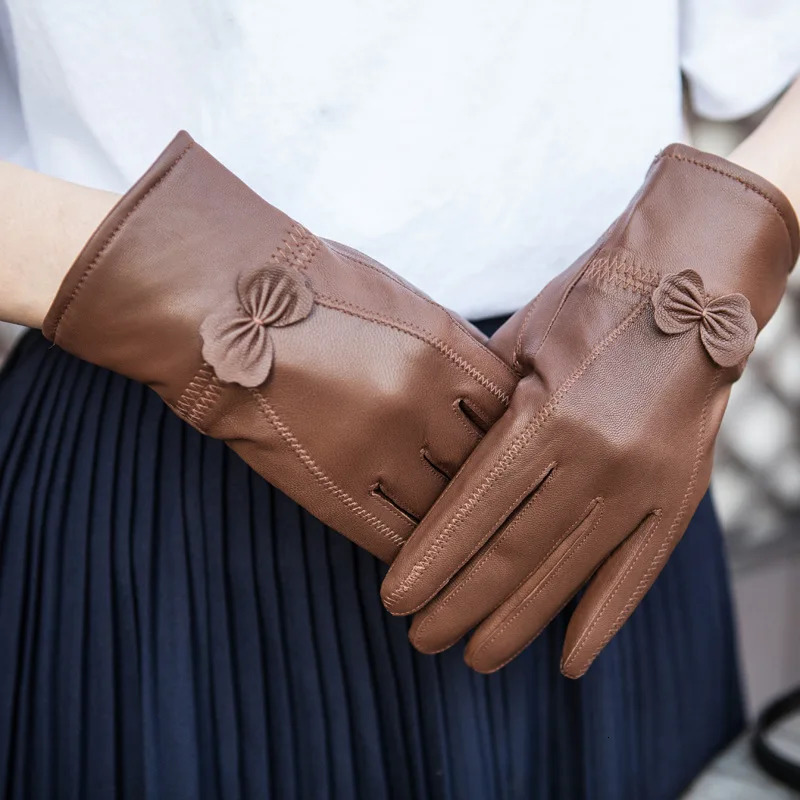 Genuine leather gloves winter womens sheepskin insulation thickened and plush thin Haining butterfly Korean version split 251023