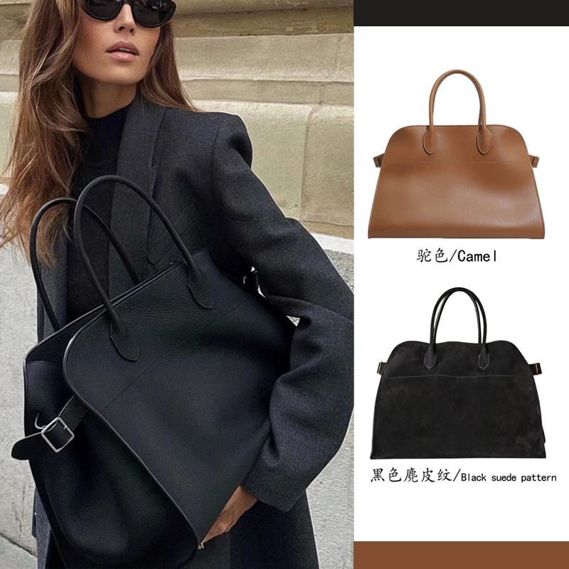 Designer Margo holding a handbag Classic versatile business bag Large capacity tote bag Fashionable crossbody bag
