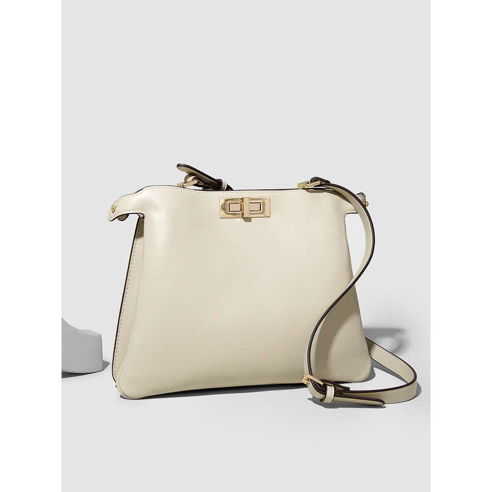 Designer Bags new high-end single-shoulder bag for ladies, a versatile soft leather commuting bag for work, and a stylish hand-held mom bag