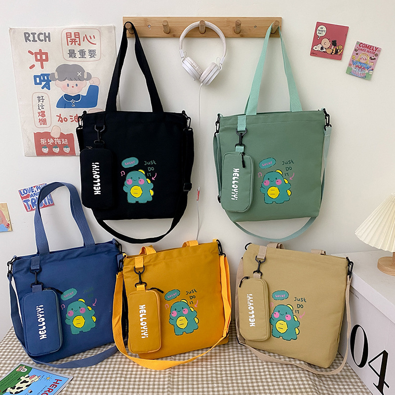 New designer student bag cartoon children's canvas bag tutoring elementary school canvas bag crossbody bag hand-held shoulder bag