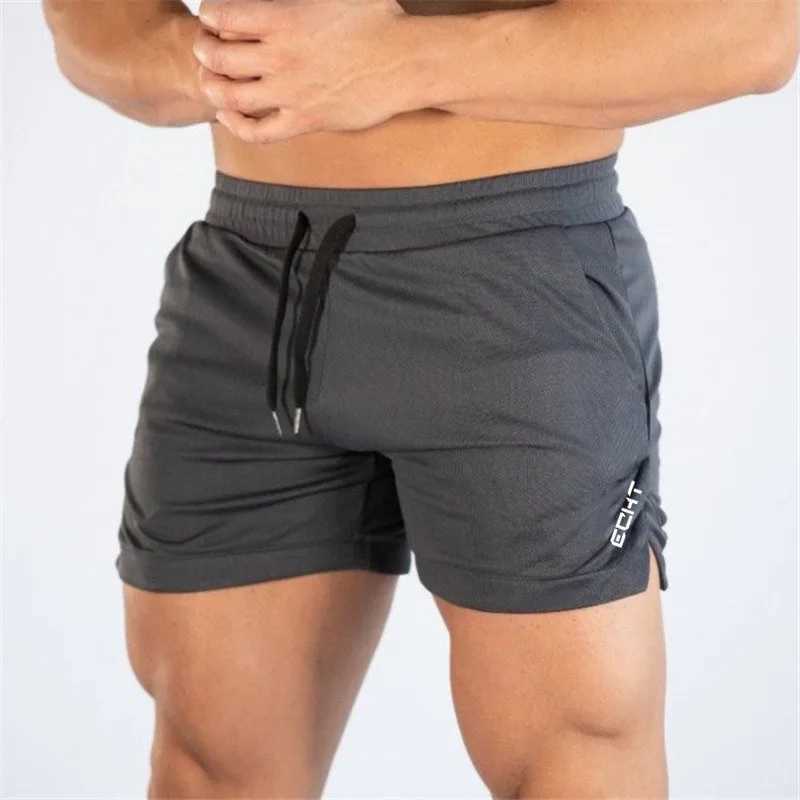 2024 New Fitness Big Muscle Man Fitness Slim Shorts Run And Train On The Beach With Pull Rope And Three Point Fitness ShortsXJ251025