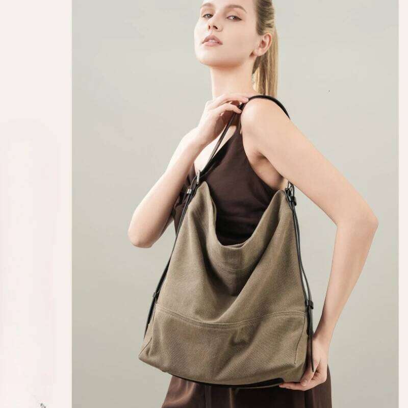 Women's Cowhide Canvas Underarm Commuter Style Bucket Tote Bag Niche Design Single-Shoulder Large-Capacity Travel Handbags 251023 1025