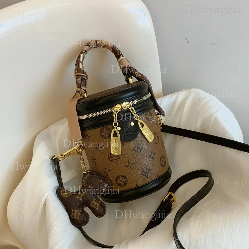 DHGM Free shipping cylinder Small women's new fashion senior cylindrical one-shoulder bucket crossbody bag dh4300051