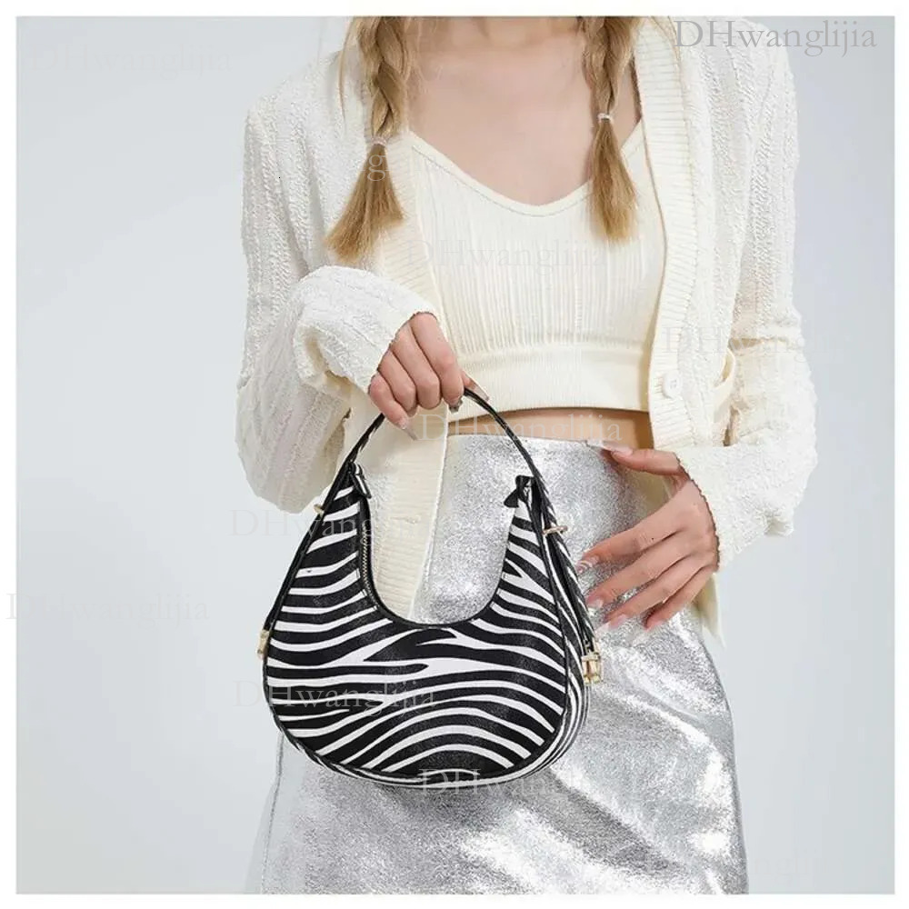 DHGM 2024 New Design Women Zebra Crossbody Bag Shoulder bag Fashion Stylish Elegant Classic design Natural Minimalist style c6a3