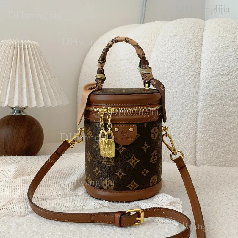 DHGM Free shipping cylinder Small women's new fashion senior cylindrical one-shoulder bucket crossbody bag dh4300051