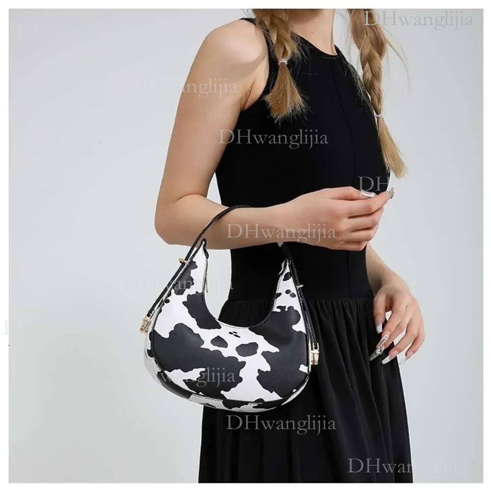 DHGM 2024 New Design Women Zebra Crossbody Bag Shoulder bag Fashion Stylish Elegant Classic design Natural Minimalist style c6a3