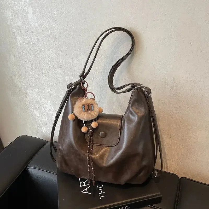 Vintage PU Leather Shoulder Bag for Women Lightweight Large Capacity Handbag with ornaments Commute Shopping Backpack Purse 251018
