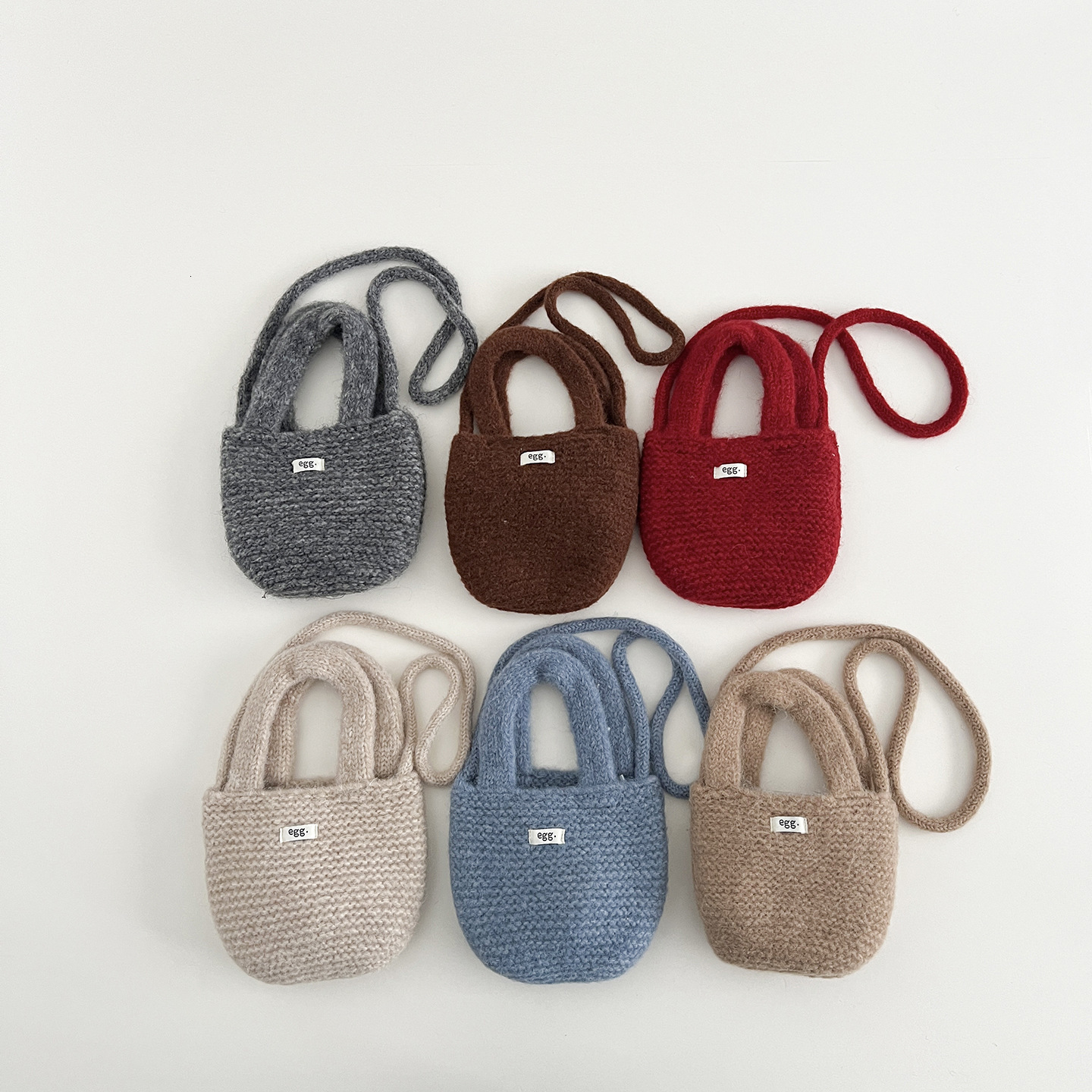 New Korean children's bag designer hand-held knitted small bag, children's candy color